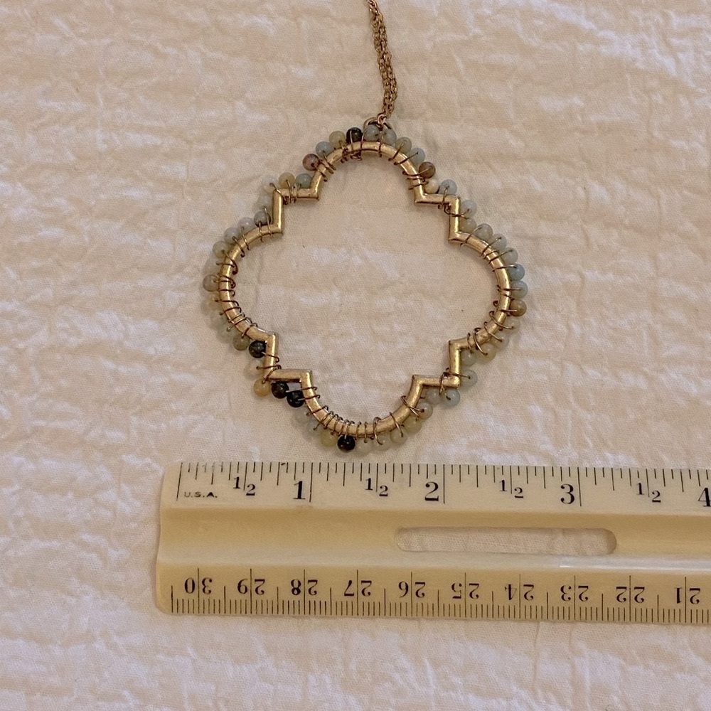 Necklace with stone bangles.